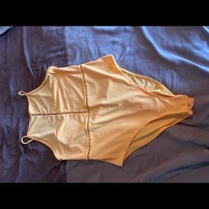 yellow bodysuit